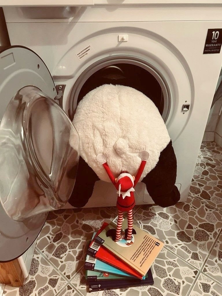 Elf Takes On Laundry Day