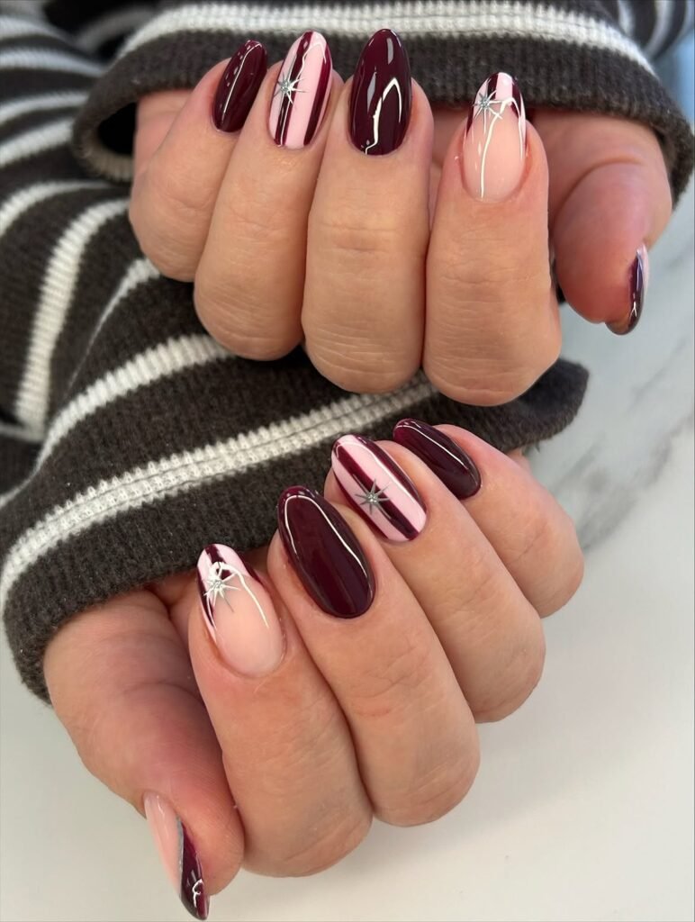 Burgundy And Pink Winter Star Nails